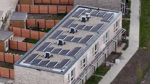 Heat Pump Systems on Modern Residential Housing Stock Footage 334579308