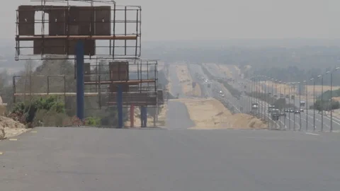 Heat radiates off of a desert road Egypt 動画素材 90920249