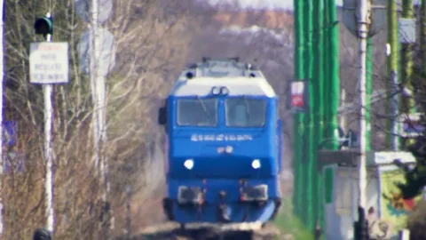 Heat waves on distant train approaching Stock Footage 105729991