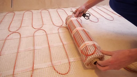 Heated floor installation Stock Footage 122570949