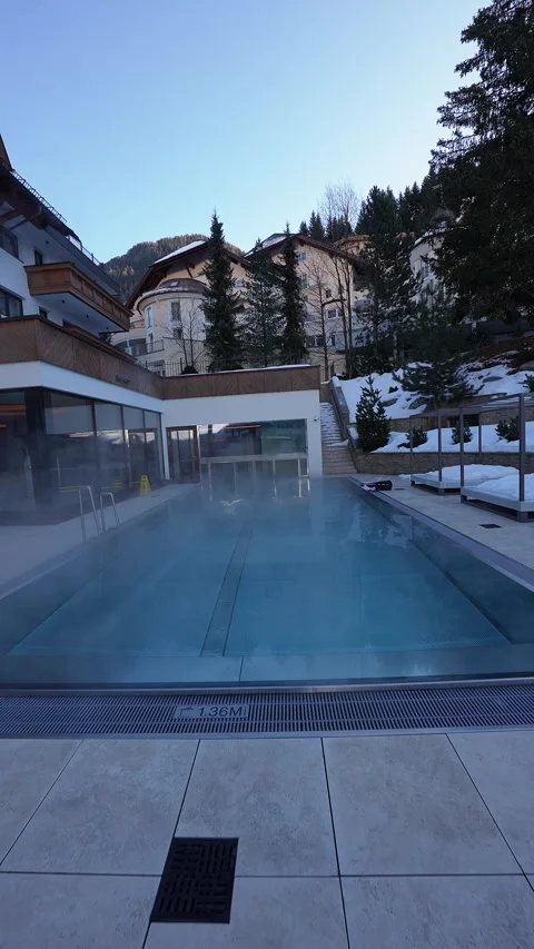 Heated infinity pool at luxury alpine hotel in Ischgl, Austria Stock Footage 331965788
