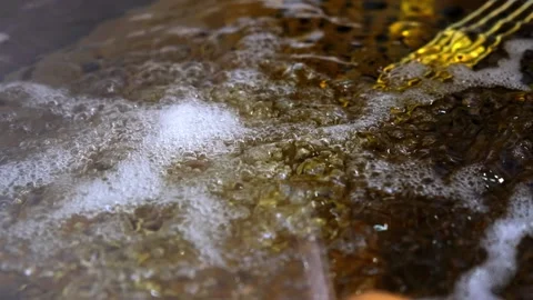 Heated oil boiling close up. Stock Footage 158320564