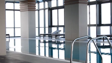 Heated swimming pool with panoramic Windows Video stock 92498159