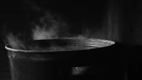 Heated water in sooty boilers, close-up Stock Footage 117420341