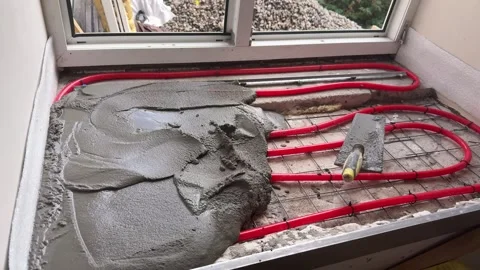 Heated windowsill construction with water pipes and mesh Stock Footage 346709958