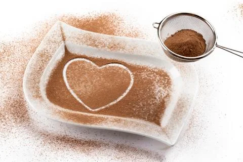 Heath shape made of coffee beans Stock Photos