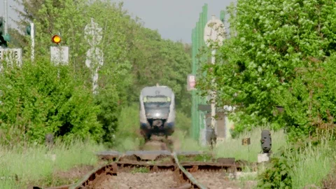 Heath waves effect on distant train approaching in summer Stock Footage 107810484