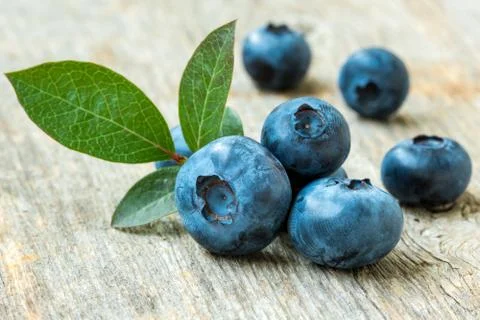 Heathberry on rustic wood table background Stock Photos