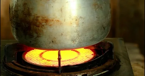 Heating Up An Aluminum Pot Stock Footage 84240514