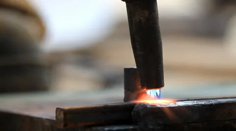 Heating and bending steel by using metal torch. Stock Footage 23919860