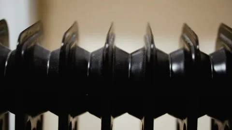 Heating battery. Black heating battery Stock Footage 99946226