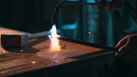 Heating the billet with a gas burner before forging Stock Footage 226331002