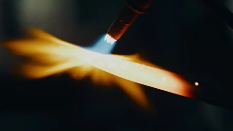 Heating up blade with blow torch Stock Footage 275441212