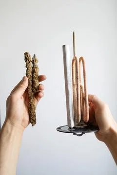 The heating element of the tank and the sediment formed from the water. Stock Photos