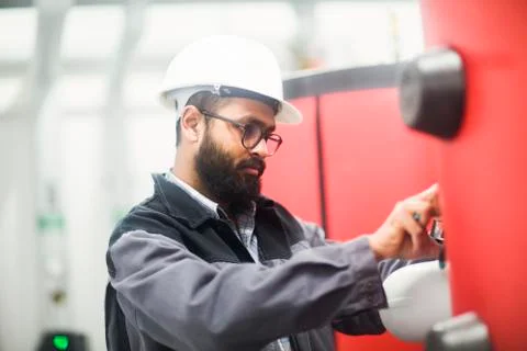 Heating engineer checking system Stock Photos