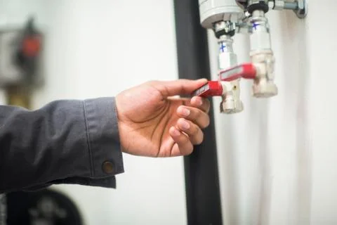 Heating engineer checking system Stock Photos