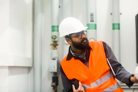 Heating engineer checking system Stock Photos