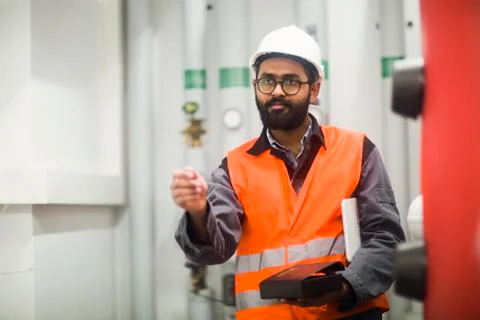 Heating engineer checking system Stock Photos