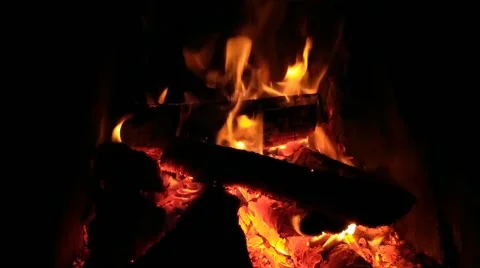 Heating by a fireplace in the house in winter Stock Footage 196149776