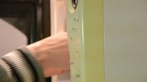 Heating food in the microwave Stock Footage 47560130