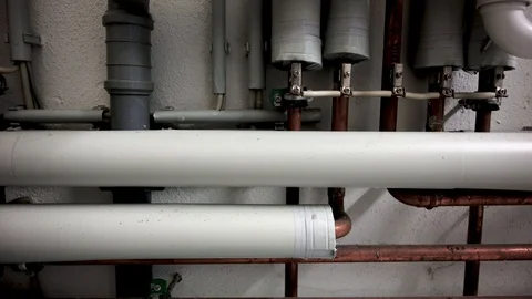 Heating installation under a water boiler with copper piping 2 Stock Footage 121531256