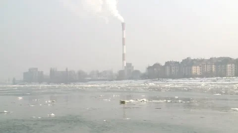 Heating plant in a city, view from frozen river Stock Footage 11165341