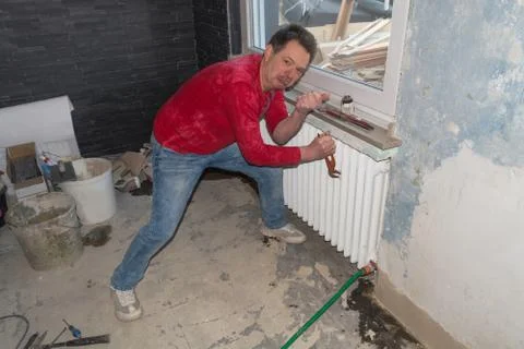 Heating plumber disassembled central heating Stock Photos