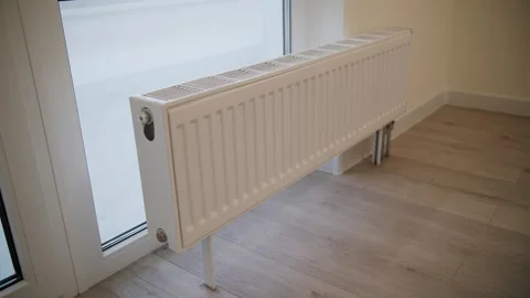 Heating radiator in the apartment next to the window Stock Footage 266491977