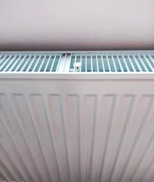 Heating radiator in the house Stock Photos