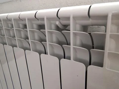 Heating radiator in the interior of the house Stock-Fotos