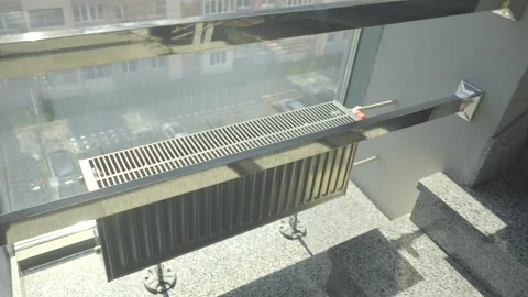Heating system radiator in the stairwell Stock Footage 287740389