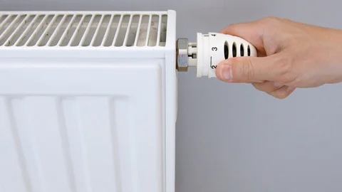 Heating thermostat adjustment Stock Footage 127186961