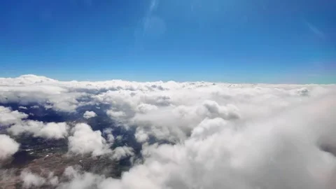 Heaven like clouds with blue sky, flying on an airplane, 4K Stock Footage 274201543