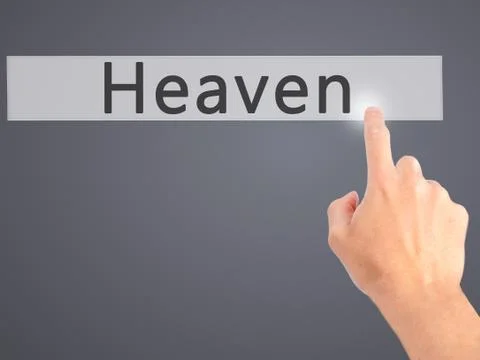 Heaven - Hand pressing a button on blurred background concept on visual scree Stock Photos