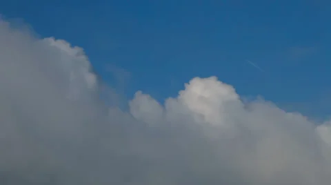 Heaven river of lumpy puffy sunny clouds and far away aircraft. Stock Footage 39553985