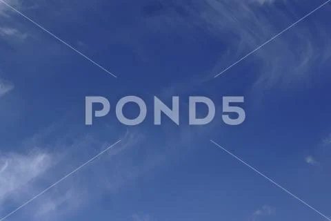 Heavenly blurred clouds dark blue sky Stock Photos