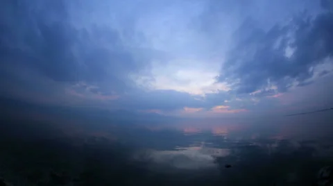Heavenly clouds over ocean at blue hours Video stock 33960109