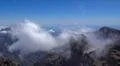 Heavenly clouds on rocky mountain peak in La Palma island Photo