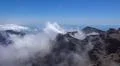 Heavenly clouds on rocky mountain peak in La Palma island Photo