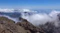 Heavenly clouds on rocky mountain peak in La Palma island Photo