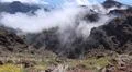 Heavenly clouds on rocky mountain peak in La Palma island Photo