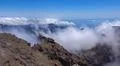 Heavenly clouds on rocky mountain peak in La Palma island Photo