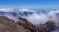 Heavenly clouds on rocky mountain peak in La Palma island Photo