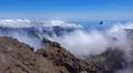 Heavenly clouds on rocky mountain peak in La Palma island Photo