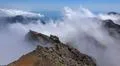 Heavenly clouds on rocky mountain peak in La Palma island Photo