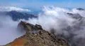 Heavenly clouds on rocky mountain peak in La Palma island Photo