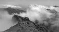 Heavenly clouds on rocky mountain peak in La Palma island Photo