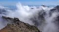 Heavenly clouds on rocky mountain peak in La Palma island Photo