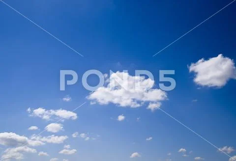 Heavenly landscape with clouds. Cumulus clouds in the sky Stock Photos
