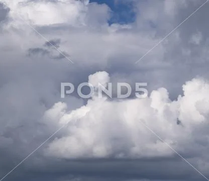 Heavenly landscape with clouds. Cumulus clouds in the sky Stock Photos